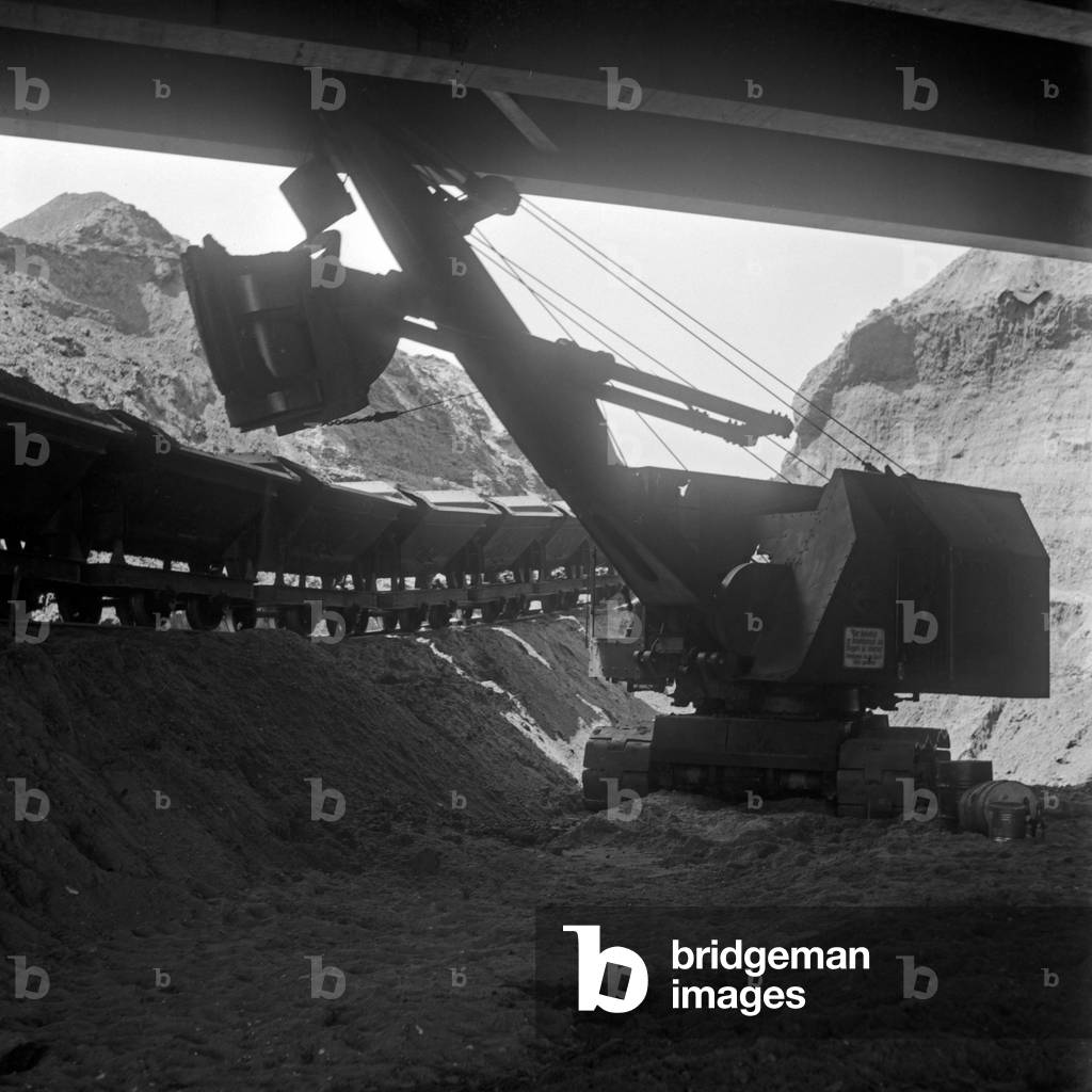 A dredge doing excavation work to build the Reichsautobahn highway, Germany 1930s (b/w photo)