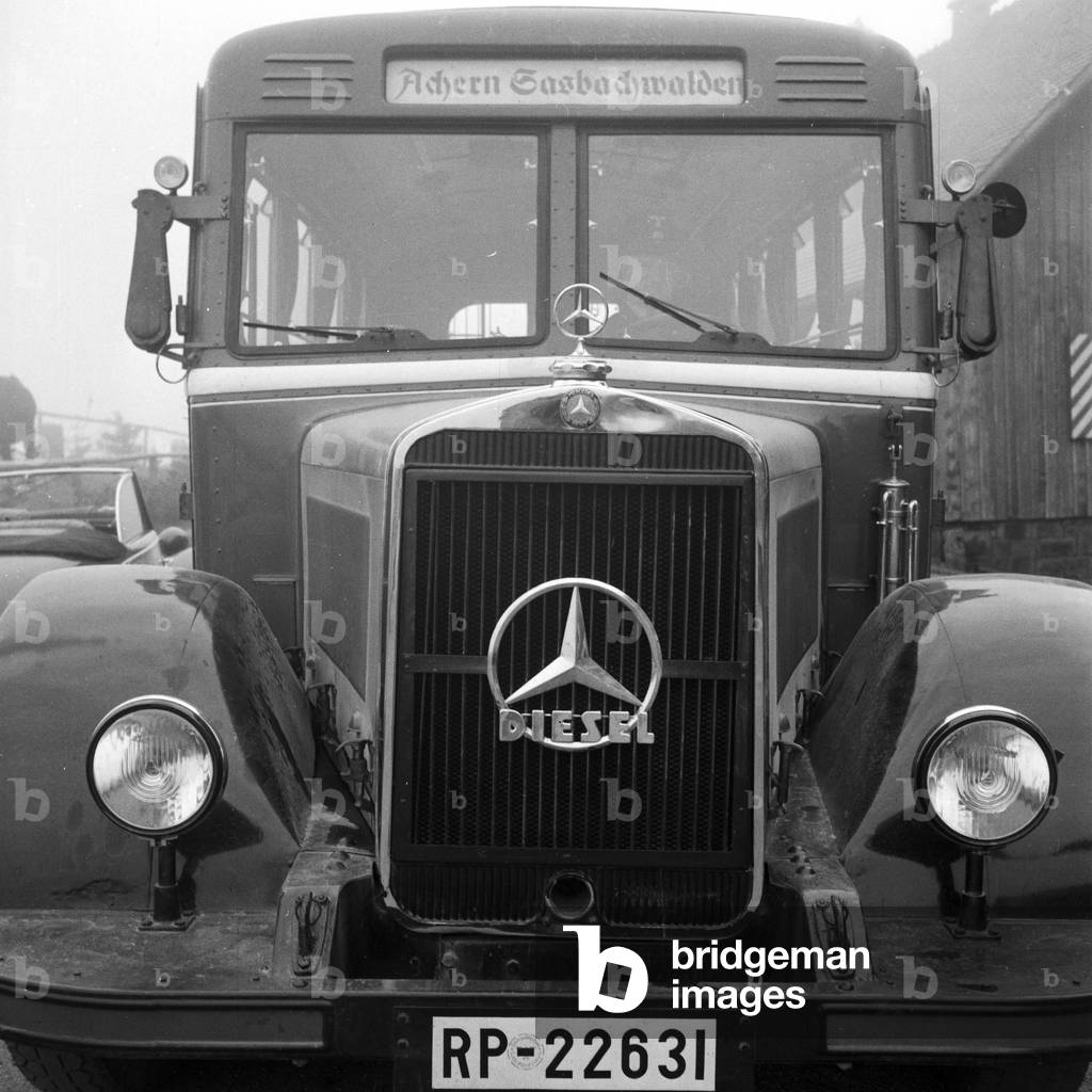 Bonnet of a Mercedes Benz Diesel coach with direction of Achern Sasbachwalden in the Ortenau district, Germany 1930s (b/w photo)