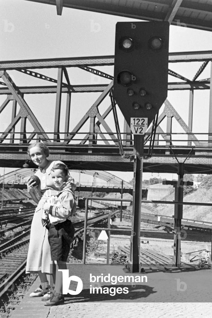 Mother and son at the platform, Germany 1930s (b/w photo)