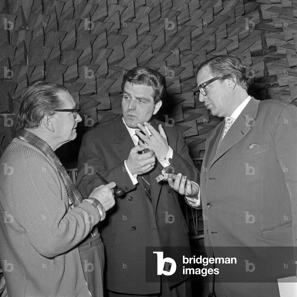 Three speakers at the microphone at an audio play production of the NDR at Hamburg, Germany 1950s