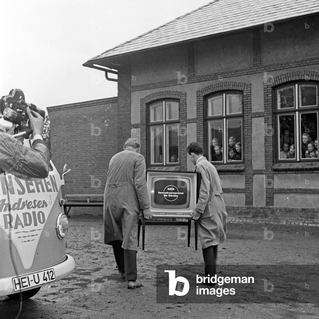 The new TV arriving at the school building at Luedersbuettel, Germany 1960s
