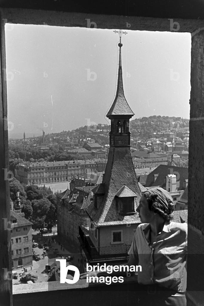 View over the inner city of Stuttgart with the spire of the Collegiate Church, Germany 1930s (b/w photo)