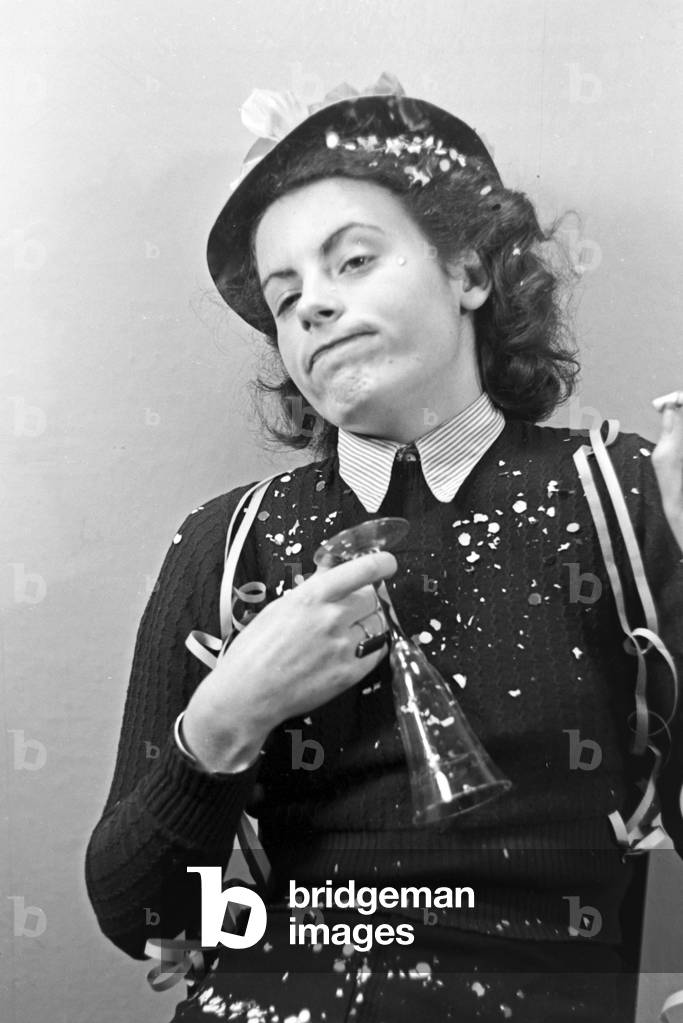 Portrait of a young woman at a carnival, Germany 1930s (b/w photo)
