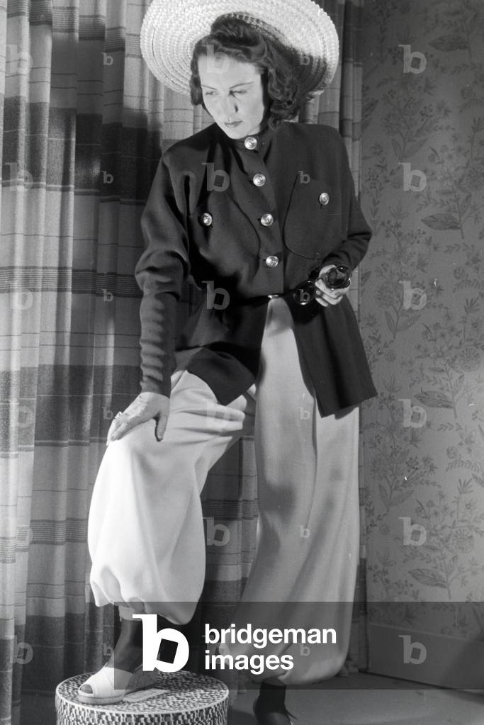 On the occasion of the Wiener Modewoche, a model is presenting new casual clothes in the house of fashion 