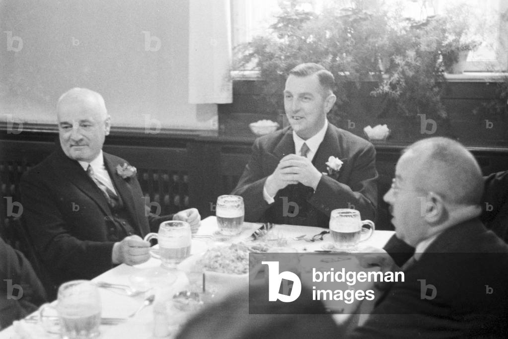 Special guests at the banquet after the Diesel anniversary ceremonial act at the MAN factory at Augsburg, Germany 1930s (b/w photo)