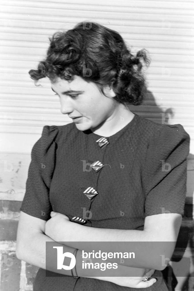 Portrait of a young woman and participant of an ice skating training coached by the Austrian figureskater and Olympics champion Karl Sch/Sfer in Dortmund, Germany 1930s