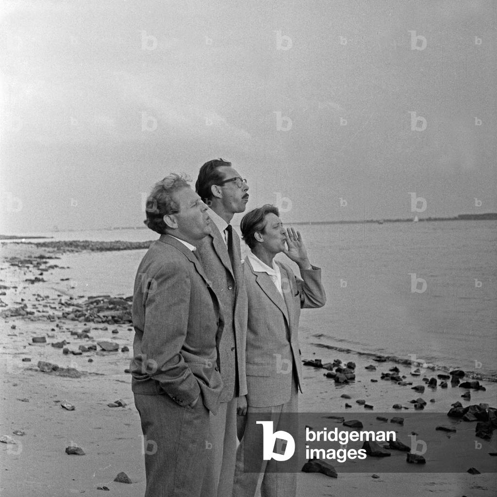 trio on the shore of river Elbe near Hamburg, Germany 1950s