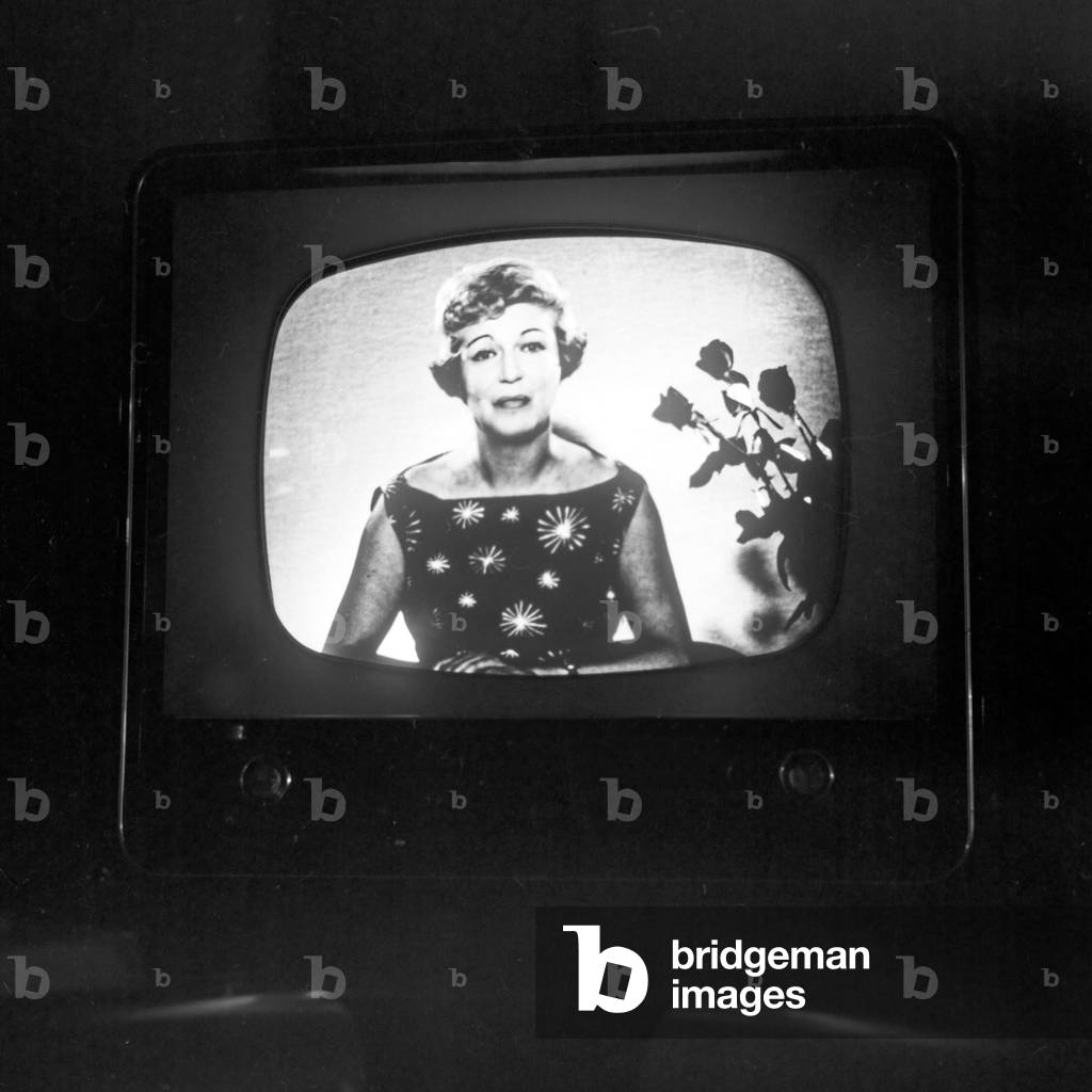 German TV presenter Angelika Feldmann from the NDR studios to a TV screen in Hamburg, Germany 1950s