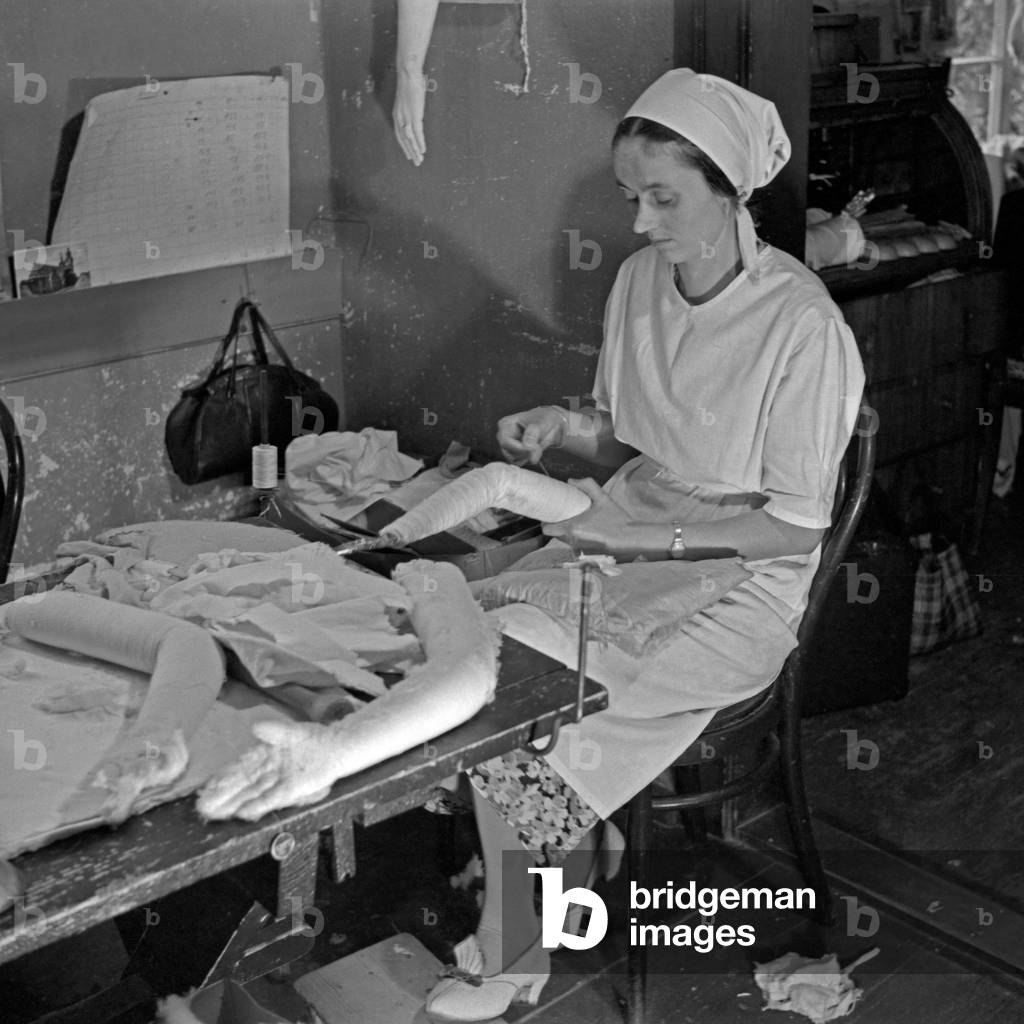 A woman from the Kaethe Kruse doll at Bad Koesen, Germany 1930s (b/w photo)