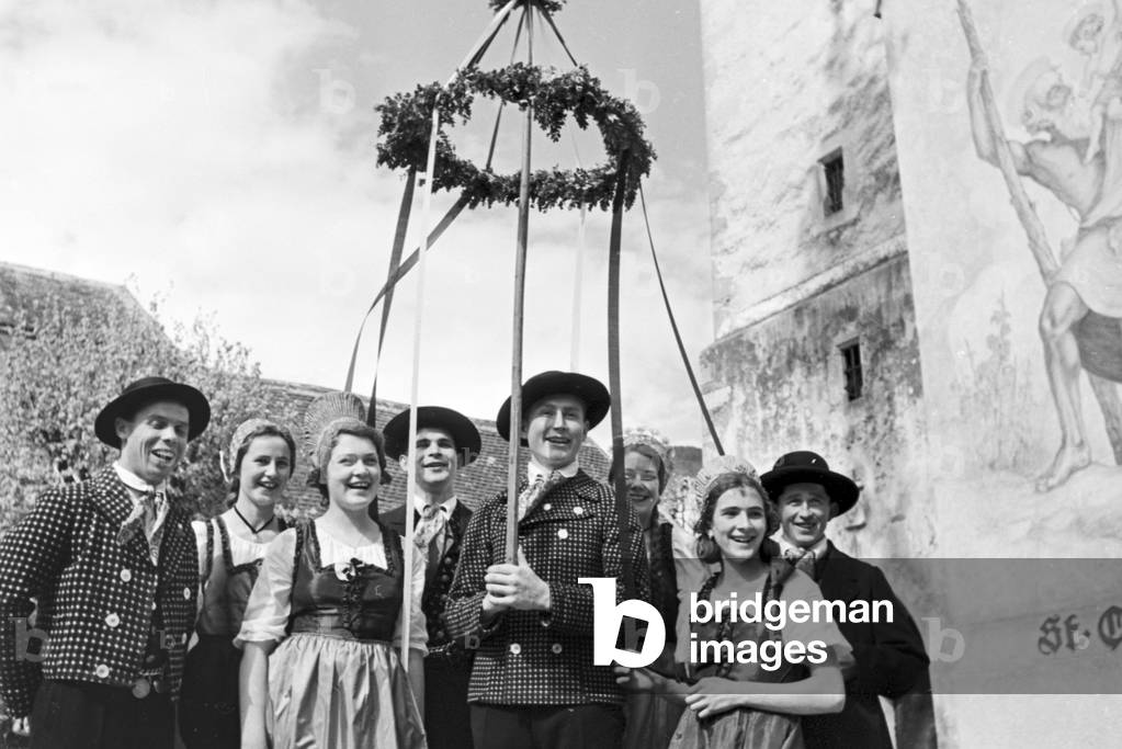 Villager in Austria celebrating the Dance into May, Germany 1930s (b/w photo)