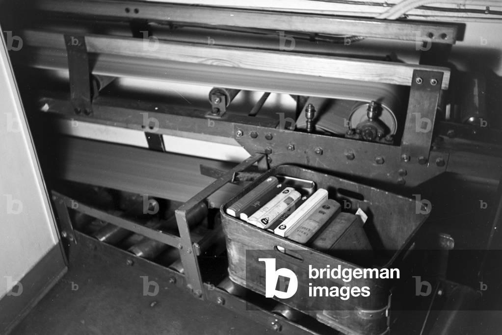 The book conveyor system in the library magazine of the Berlin State Library (former Prussian State Library), Germany 1930s (b/w photo)