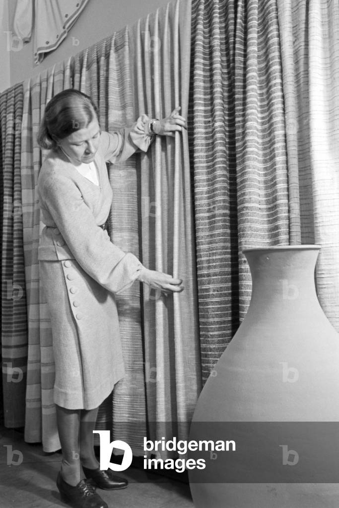 Products of Adolf Bauer & Sons' weaving mill as exhibits, Germany 1940s (b/w photo)