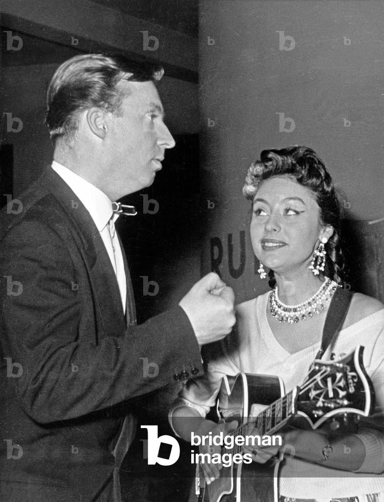 Italian singer, dancer and actress Caterina Valente with Austrian singer Peter Alexander, Germany 1950s