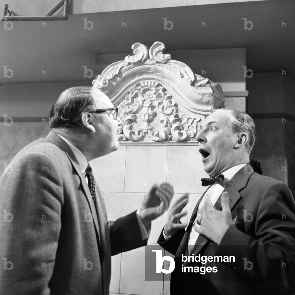 German comedians Heinz Erhardt and Erich Fiedler having a brandy, Germany 1960s