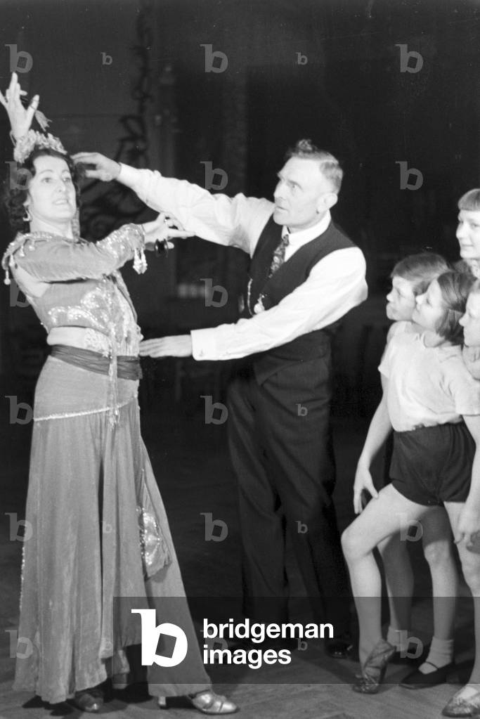 Woman with children at a circus artist's school, Germany 1930s (b/w photo)
