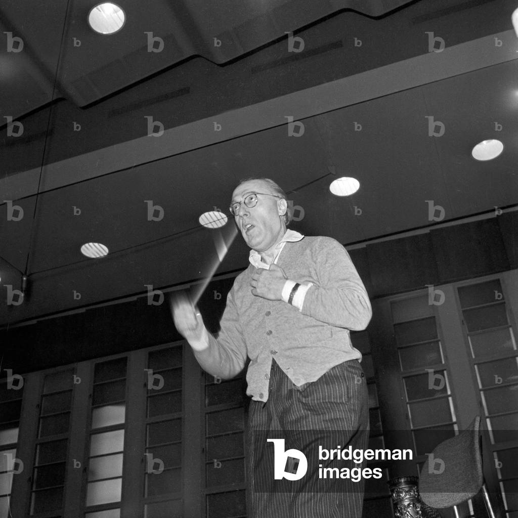 A conductor of a choir performing at Studio 10 of German TV and radio station NDR at Hamburg, Germany 1950s