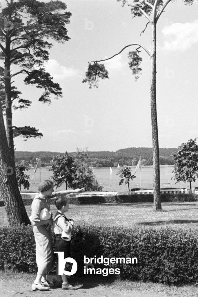 Mother and son at lake Wannsee lido in Berlin, Germany 1930s (b/w photo)