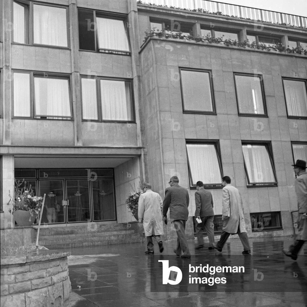 Men entering an office building at Hamburg, Germany 1950s