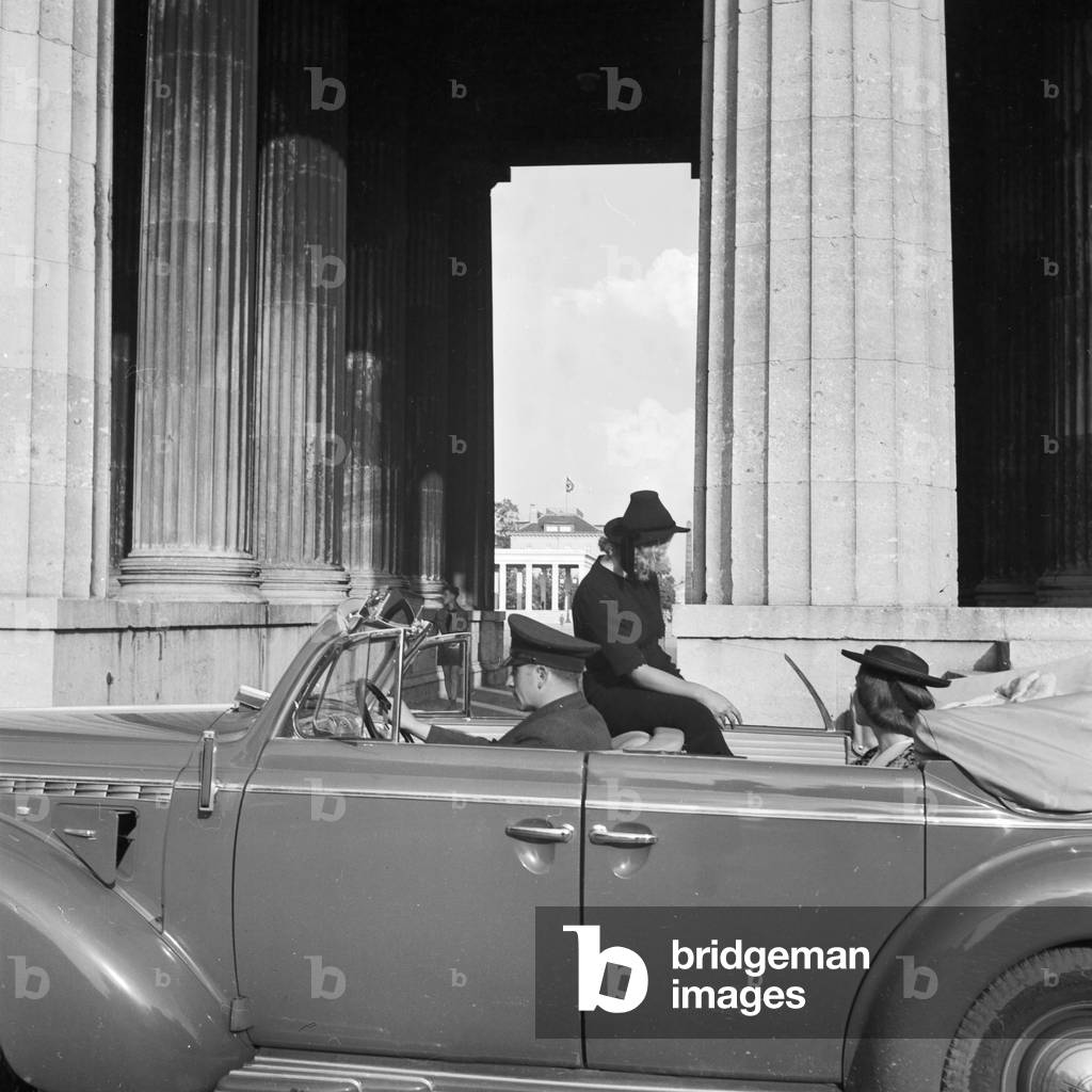 An Opel model Admiral coming to Koenigsplatz square at Munich, Germany 1930s (b/w photo)