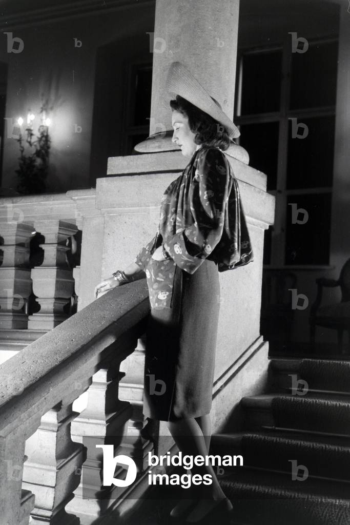 A model is presenting a suit, on the occasion of the Wiener Modewoche in the house of fashion 