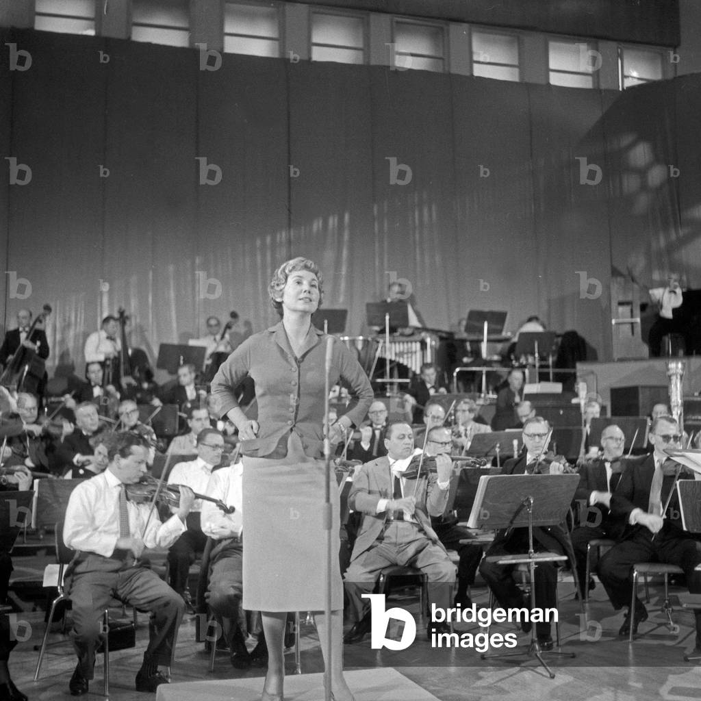 German singer Anneliese Rothenberger doing rehearsals for a telerecording, Germany 1950s