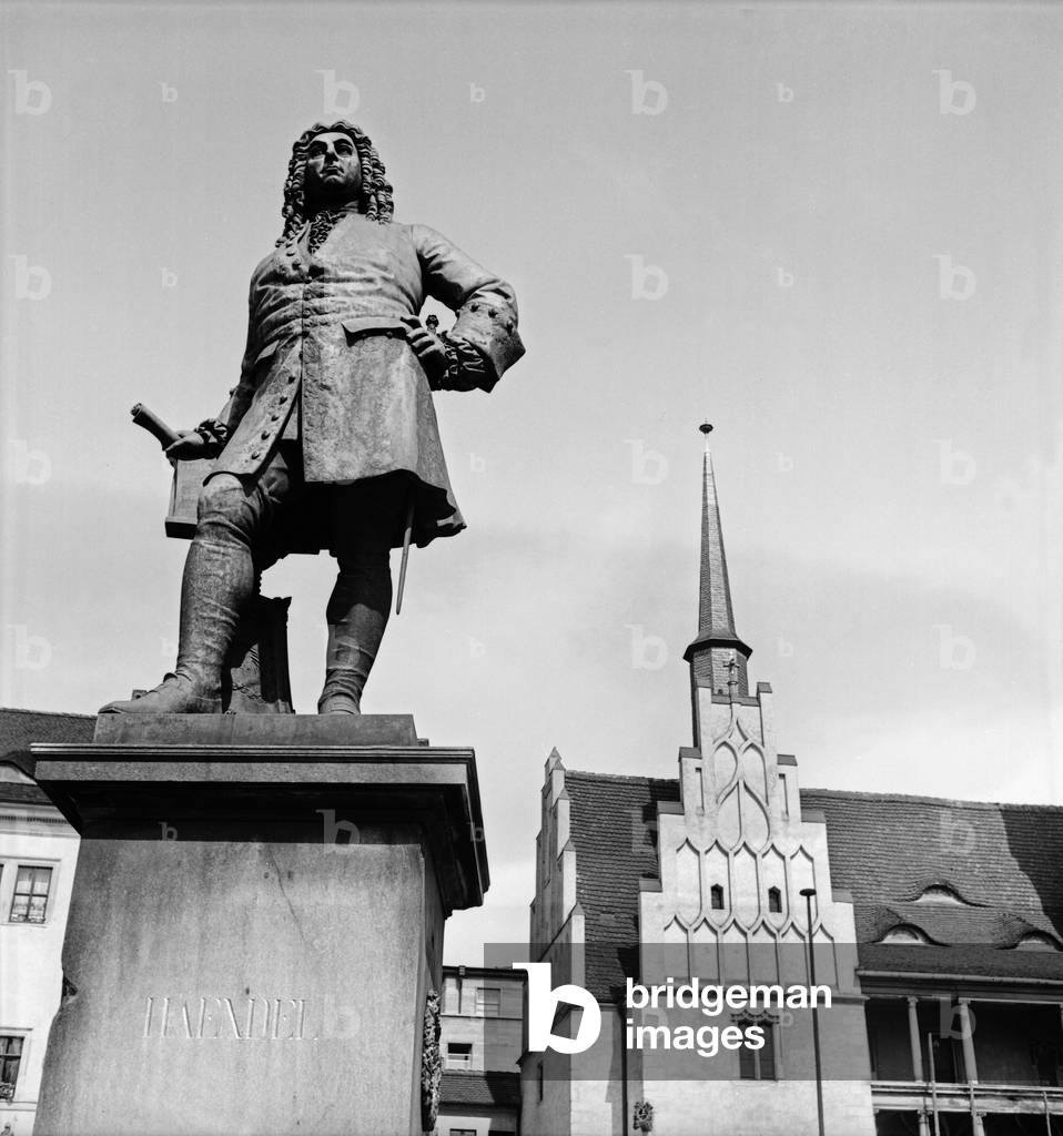Monument fo German composer Georg Friedrich Haendel at the city hall square of Halle at river Saale, Germany 1930s (b/w photo)