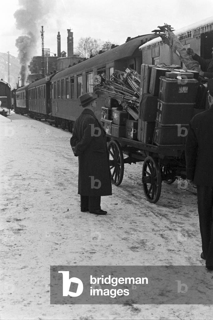 Rail traffic in a snowy winter landscape, Germany 1930s (b/w photo)