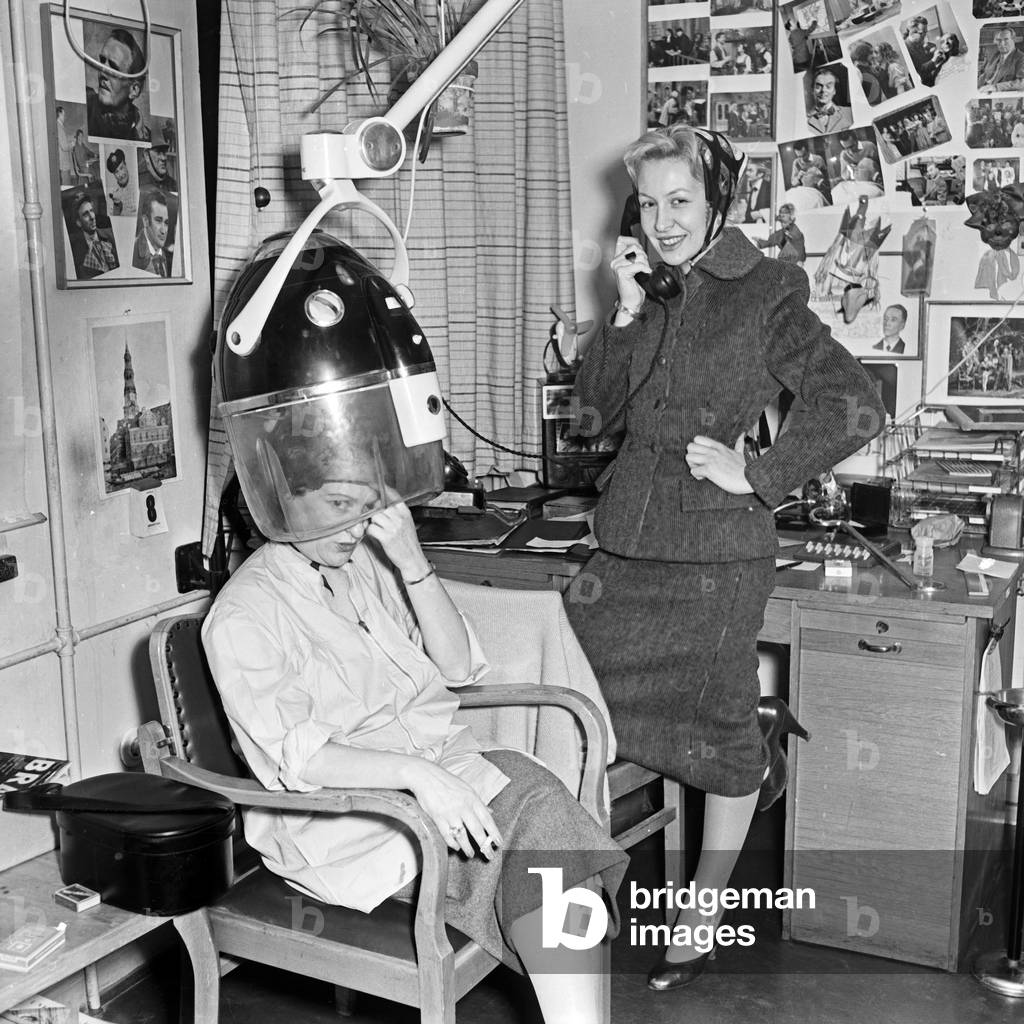 Two women at their hairdresser at Hamburg, Germany 1950s