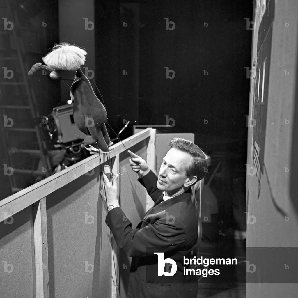Puppets and puppeteers at a Hamburg puppetry, Germany 1960s