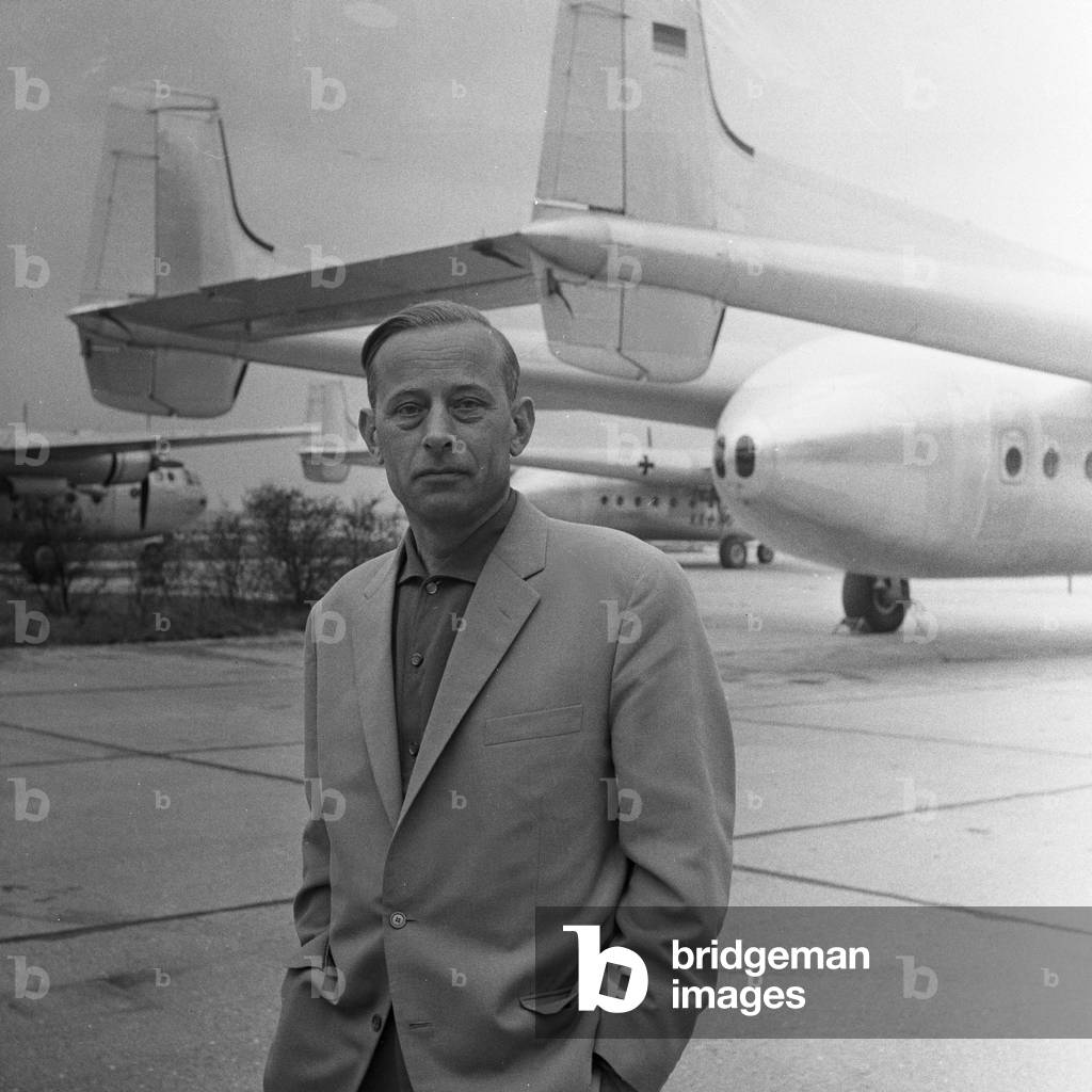 In front of a transport airplane of German Bundeswehr Air Force at the factory in Finkenwerder, Germany 1960s
