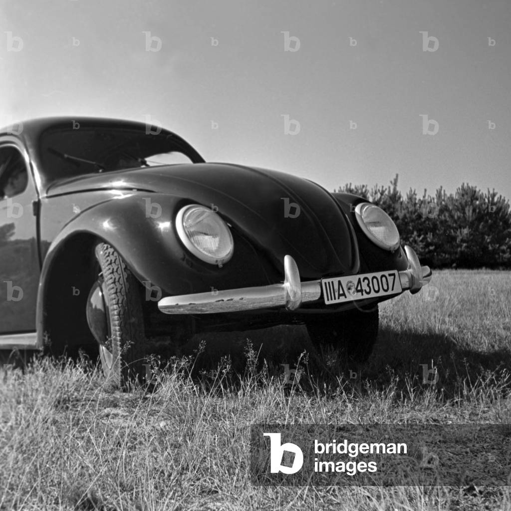 Front view of the Volkswagen beetle, or KdF car, on the test track near Wolfsburg, Germany 1930s (b/w photo)
