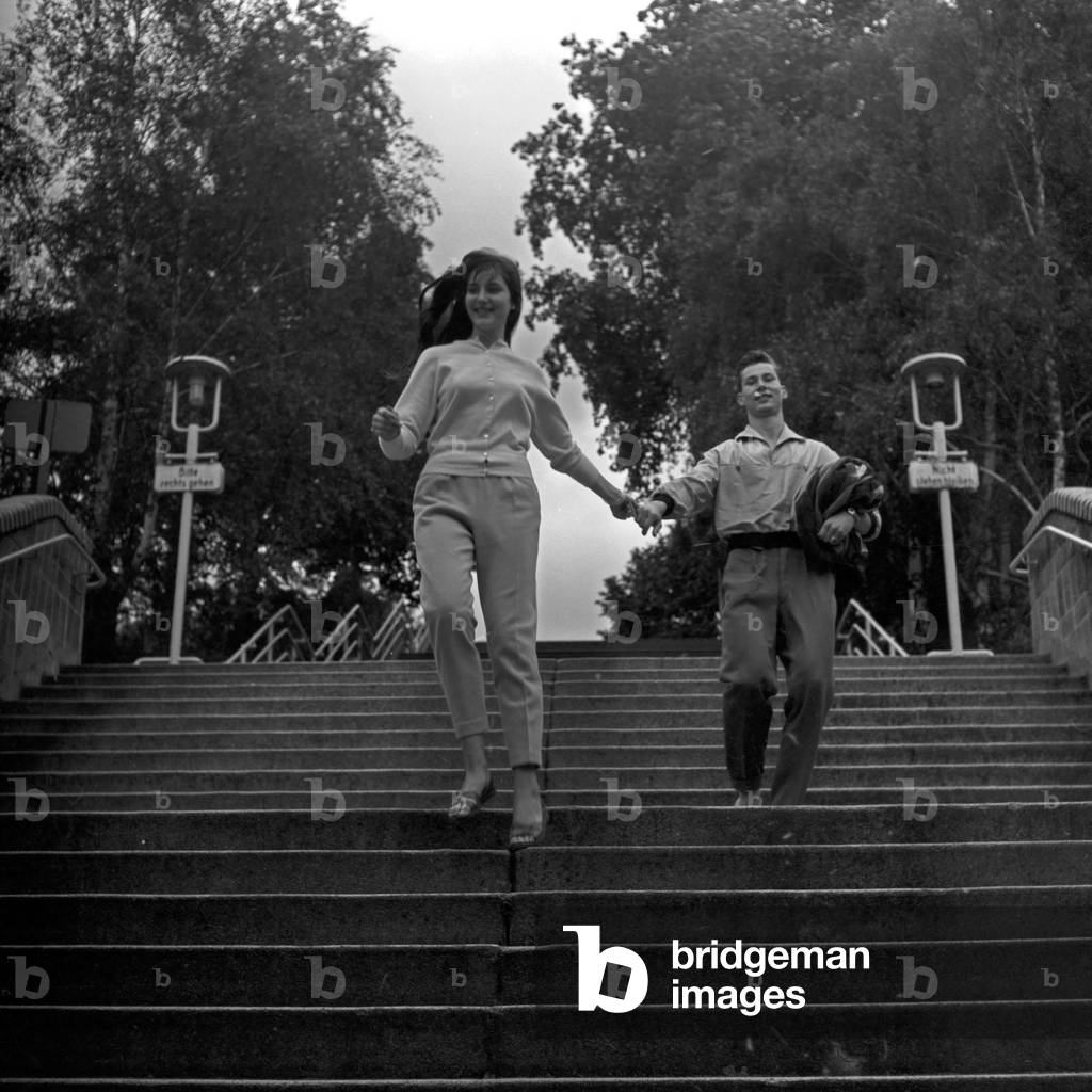 Siblings Maria and Franco Duval strolling through Berlin, Germany 1950s
