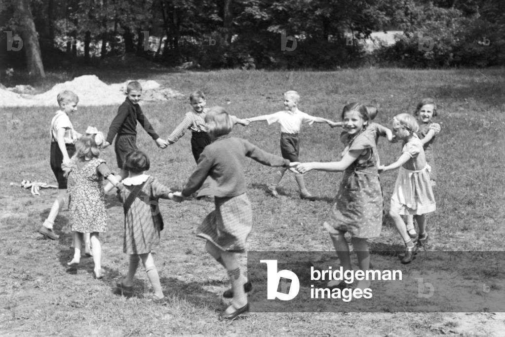 Scenes from childhood in Germany during the 1930s (b/w photo)