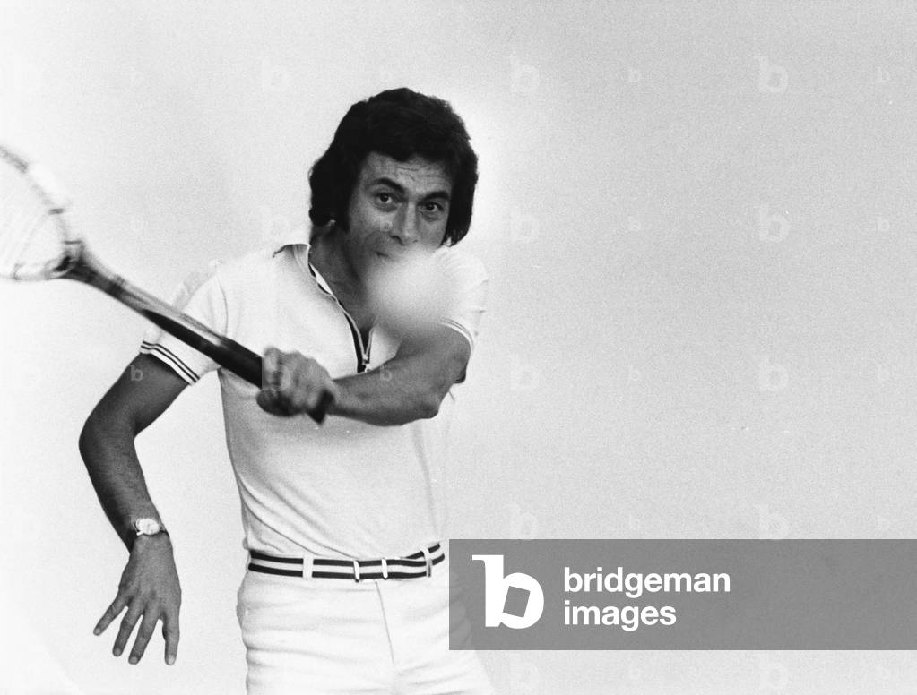 German radio and TV presenter Manfred Sexauer playing tennis in 1975