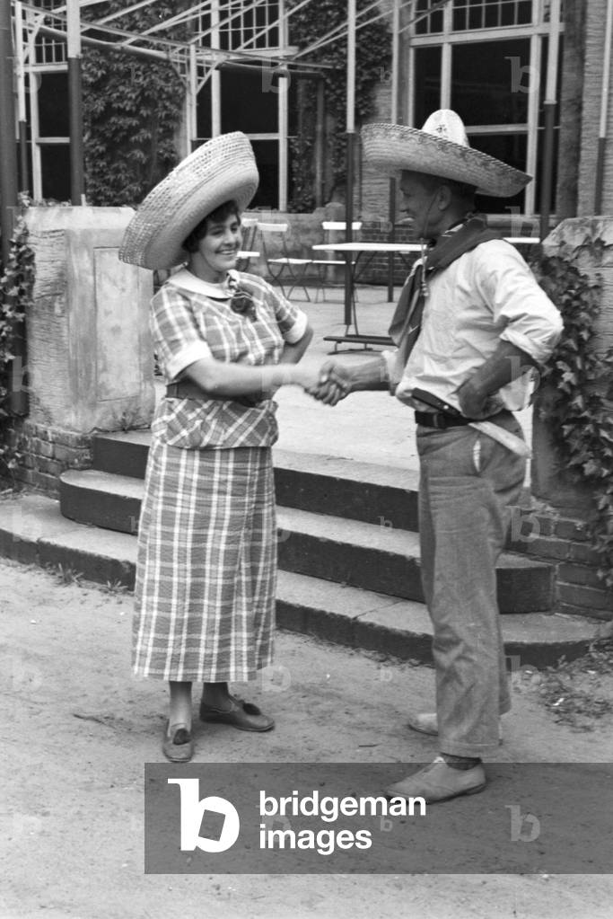 Scenes from childhood in Germany during the 1930s (b/w photo)