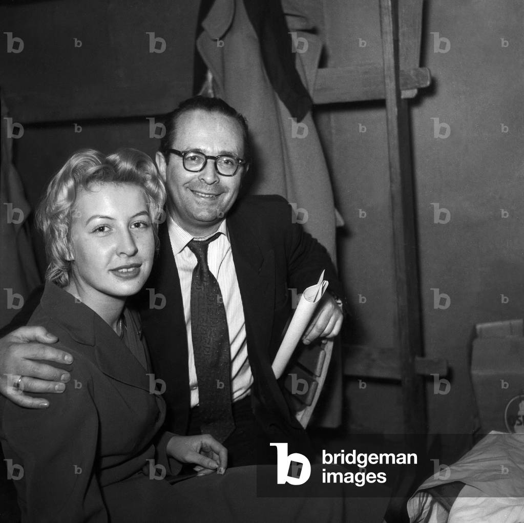 A young female artist with a man at the German TV lottery show 