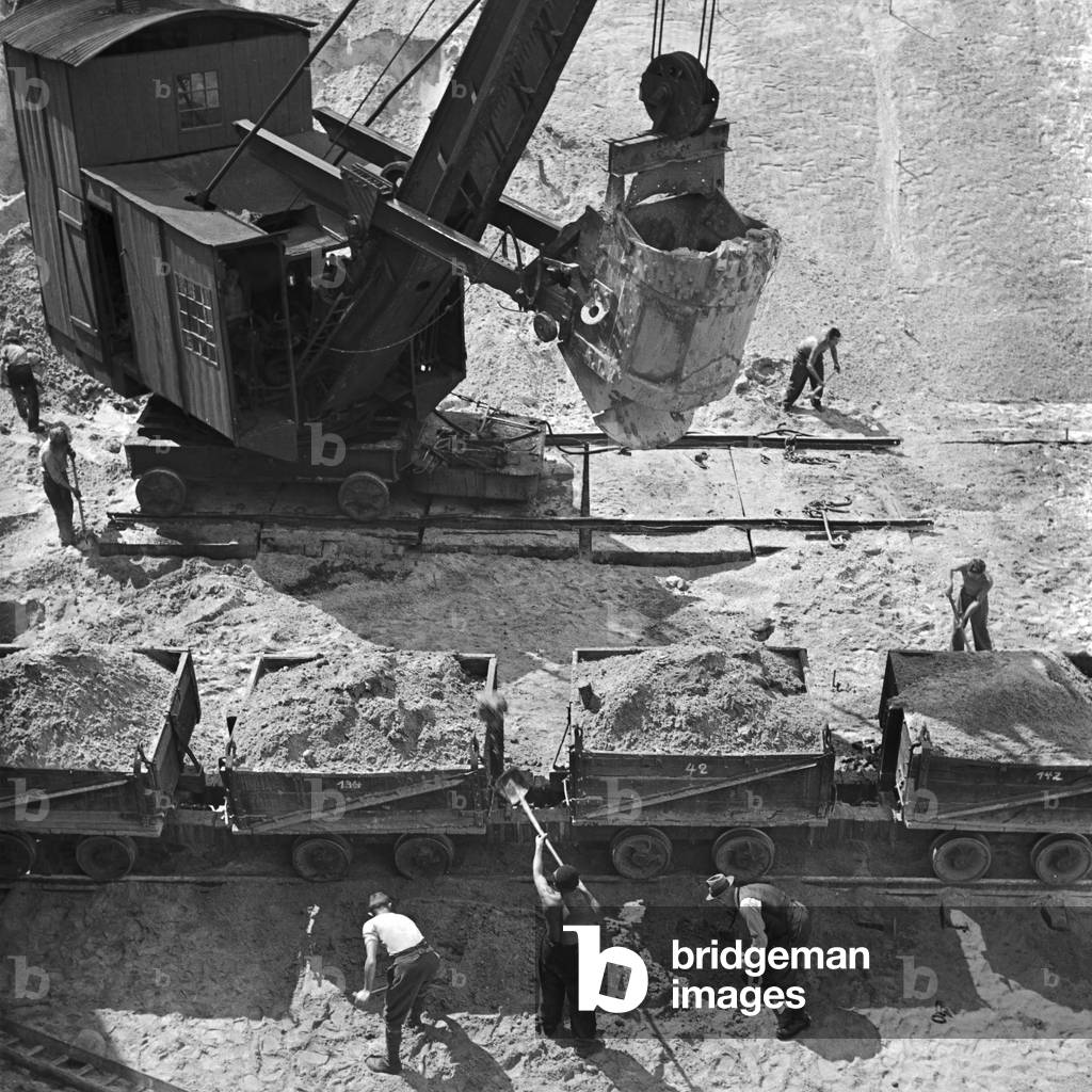 Motor feeder at Reichsautobahn highway - continous construction of the motorway feeder although the war at Nikolassee, Germany 1940 (b/w photo)