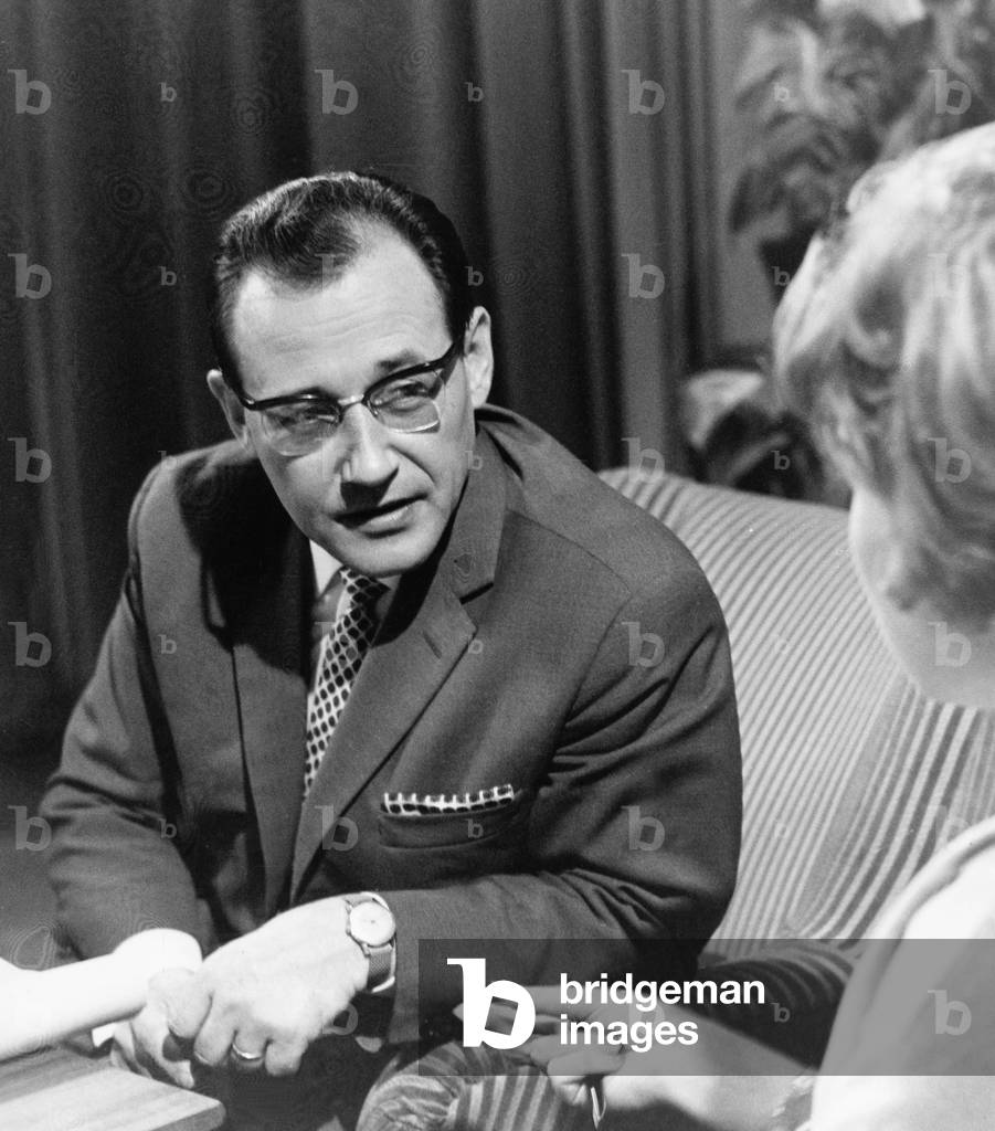 German TV journalist talking with Christa Schrader, mid 1960s