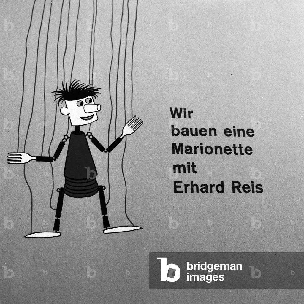 TV presenter Eduard Reis doing handicrafts and produces merionettes and stick puppets, Germany 1960s