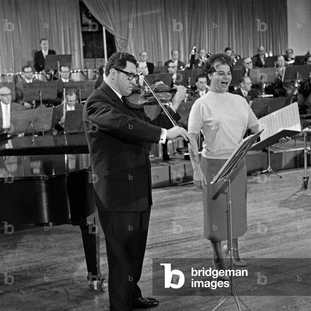 German soprano singer Irmgard Seefried with her husband Wolfgang Schneiderhan doing rehearsals for a concert at Hamburg, Germany 1960s