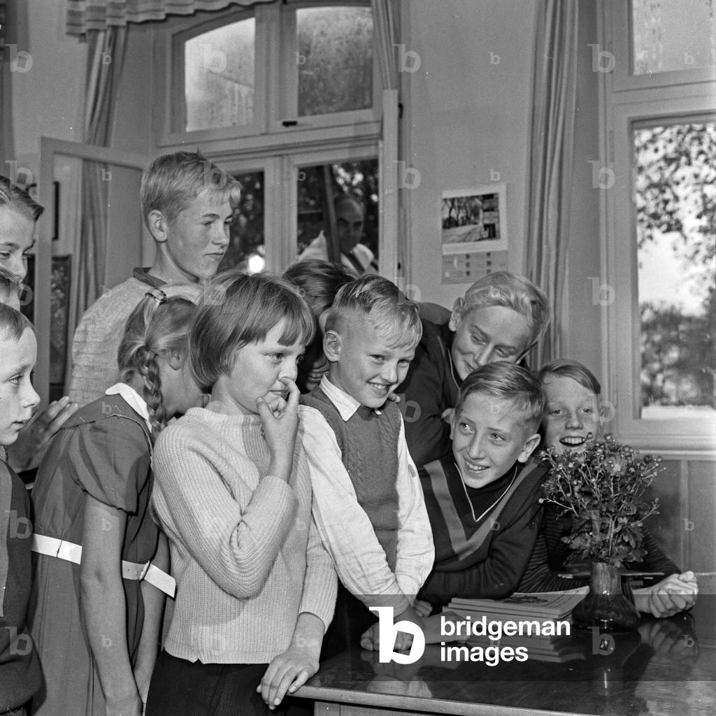 School kids can not wait to get their own TV in the building at Luedersbuettel, Germany 1960s