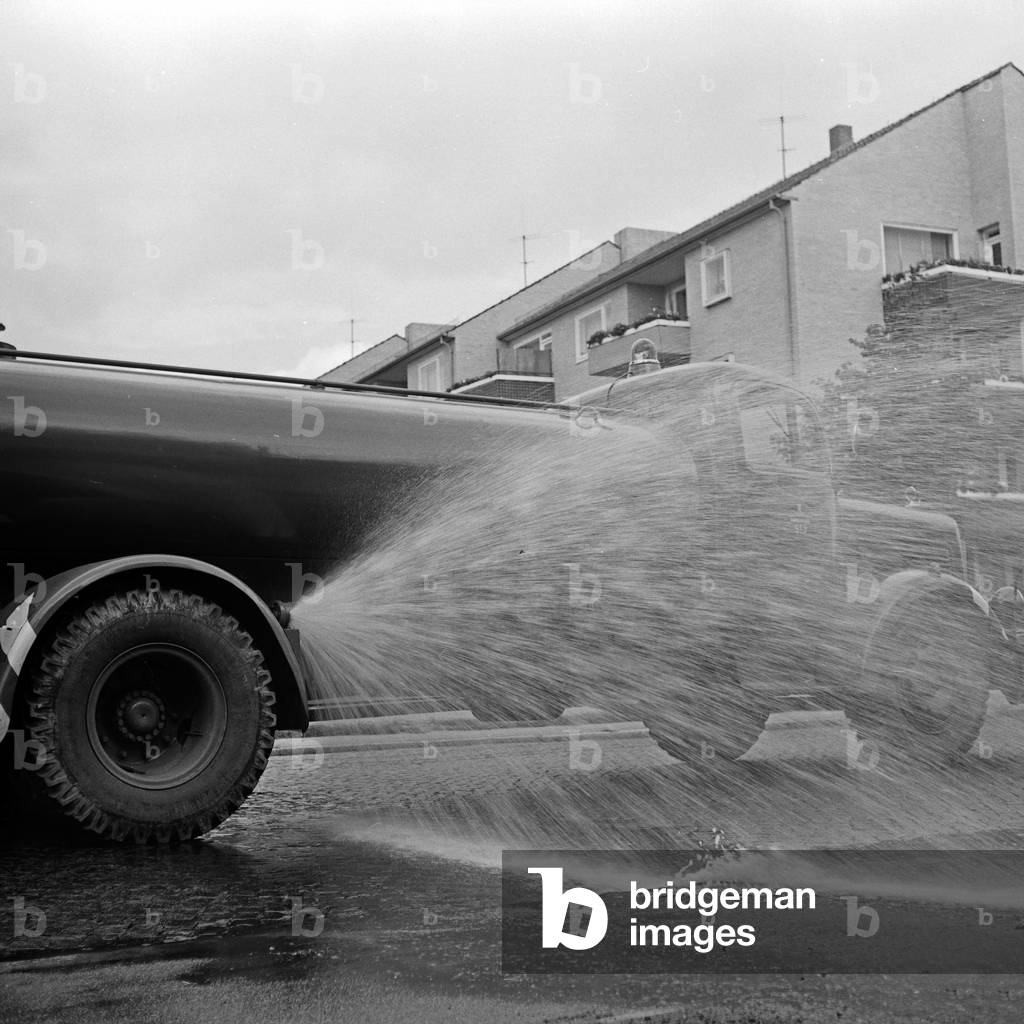 Wet cleaning on the streets of Hamburg, Germany 1960s