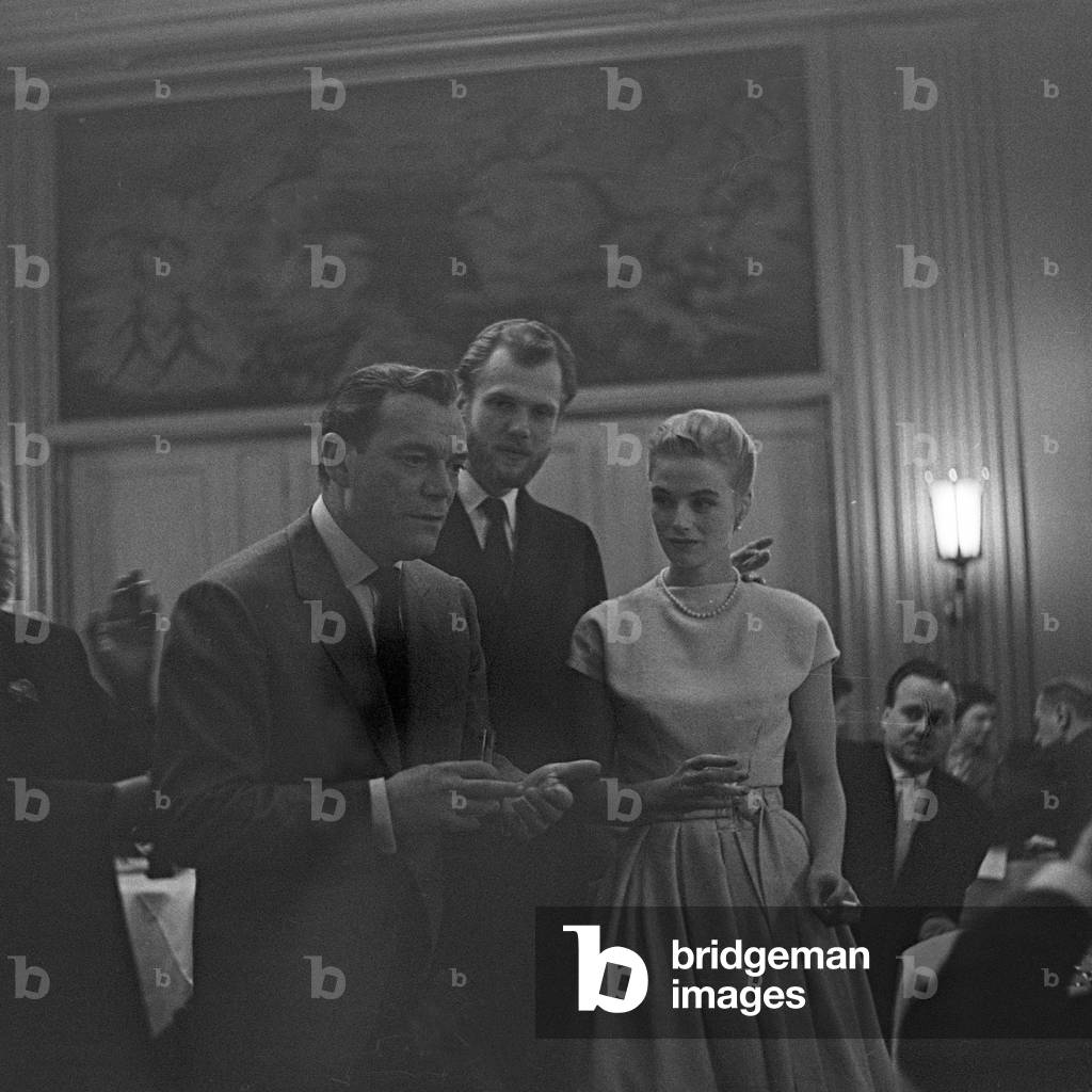 American actor and chansonnier Eddie Constantine meets Danish singer duo Nina and Frederik at Hamburg, Germany 1950s