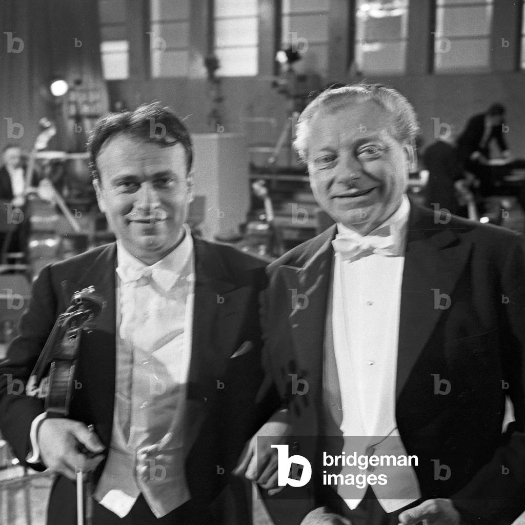 Polish violinist Henryk Szeryng performing with German conductor Hans Schmidt Isserstedt at Hamburg, Germany 1960s