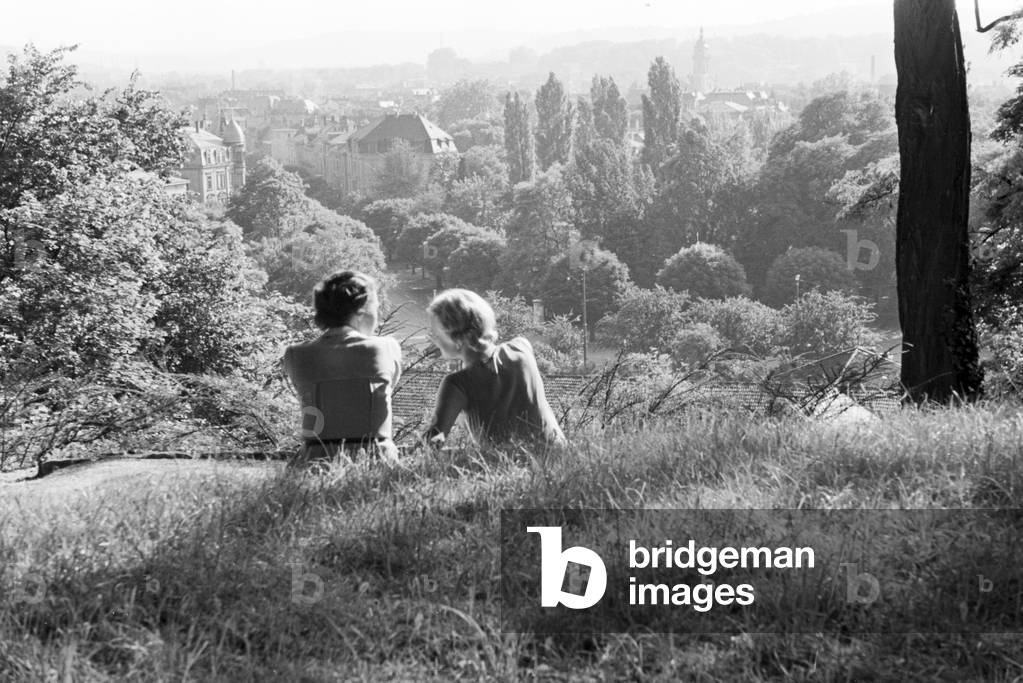 Two young women enjoying the panoramic view of Stuttgart, Germany 1930s (b/w photo)