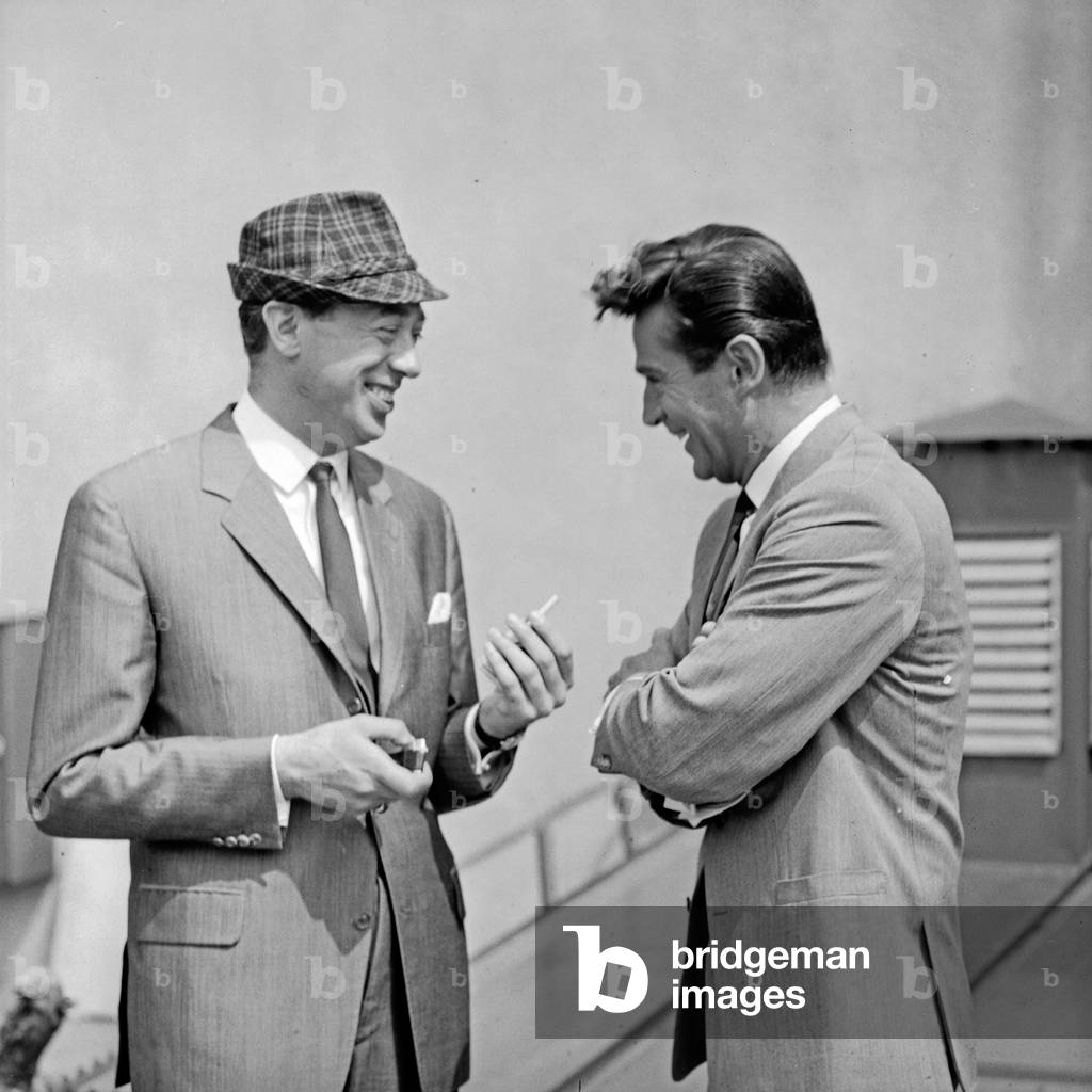 Actors Horst Tappert (left) and George Nader on the rooftops of Hamburg, Germany 1960s