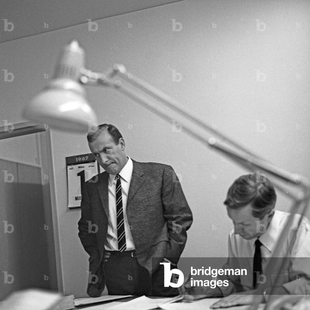 German news presenter Karl Heinz Koepcke at editor's office of news show 