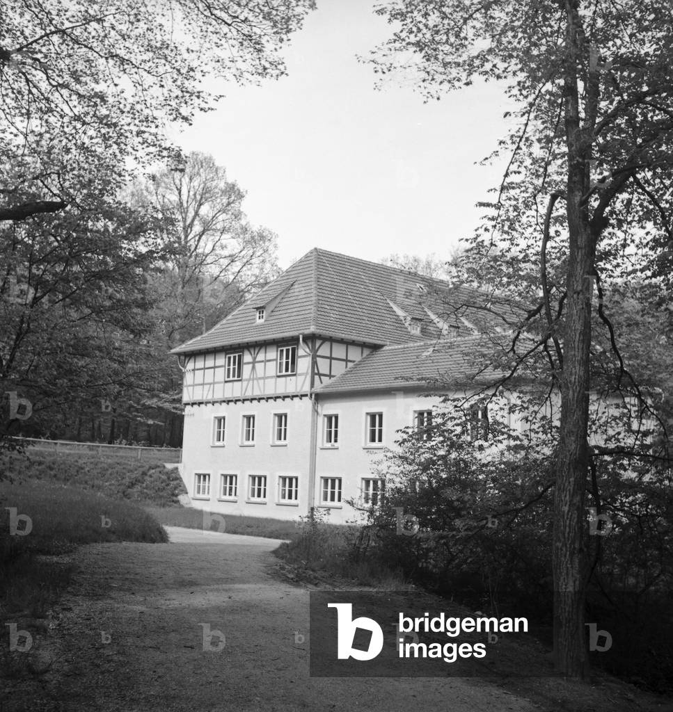 On the way through German landscape and small town, Germany 1930s (b/w photo)
