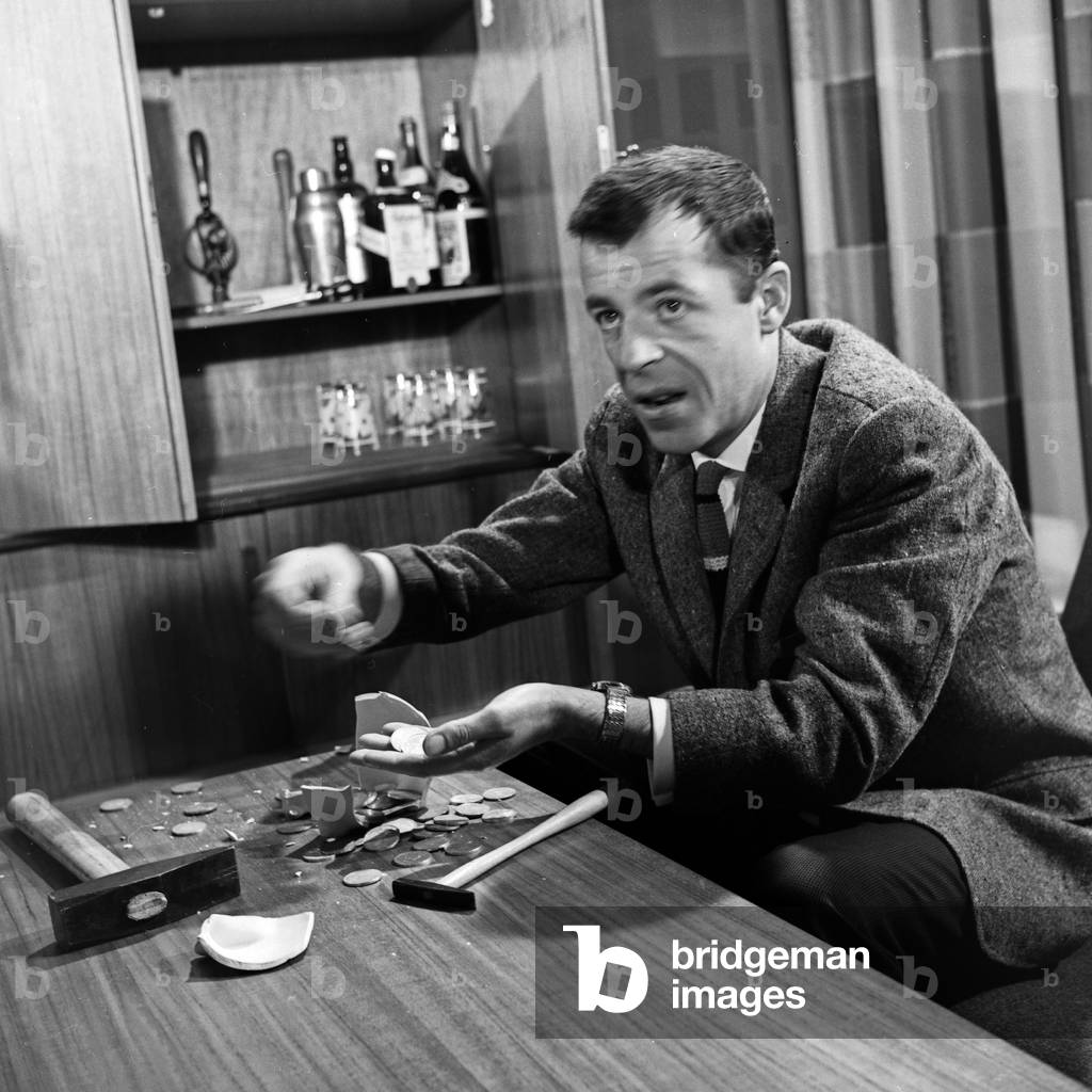 TV presenter Chris Howland promoting Germany TV lottery 1962 at Hamburg, Germany 1960s
