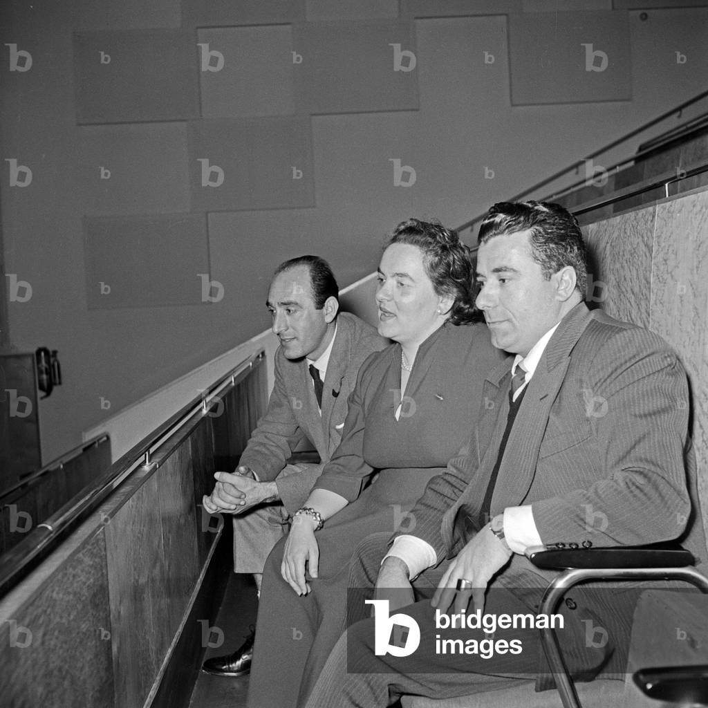 Two men and a woman sitting on the grandstand of Studio 10 at NDR in Hamburg, Germany 1950s